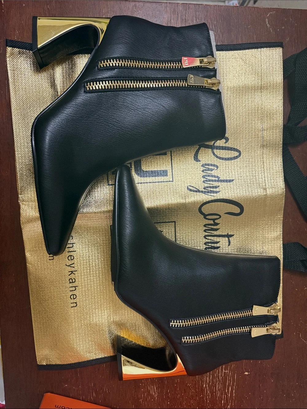 Jimmy Choo Black Leather Ankle Booties with Gold Zippers & Metallic Heel